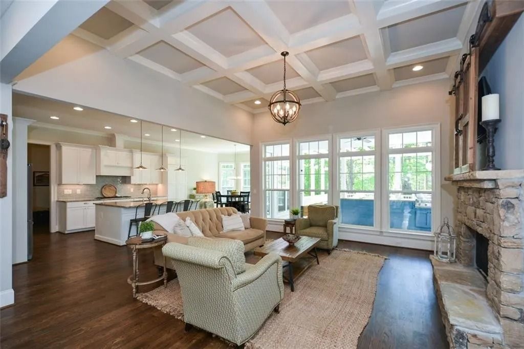 A living room filled with furniture and a fireplace