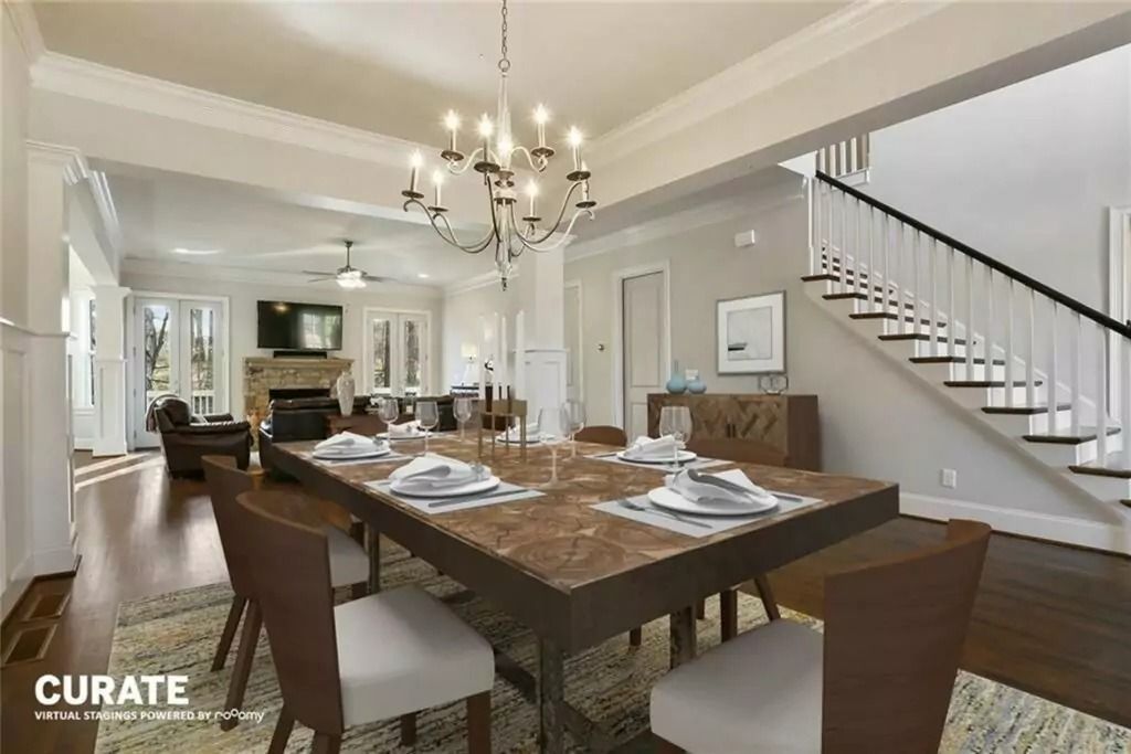 A computer generated image of a dining room with a table and chairs