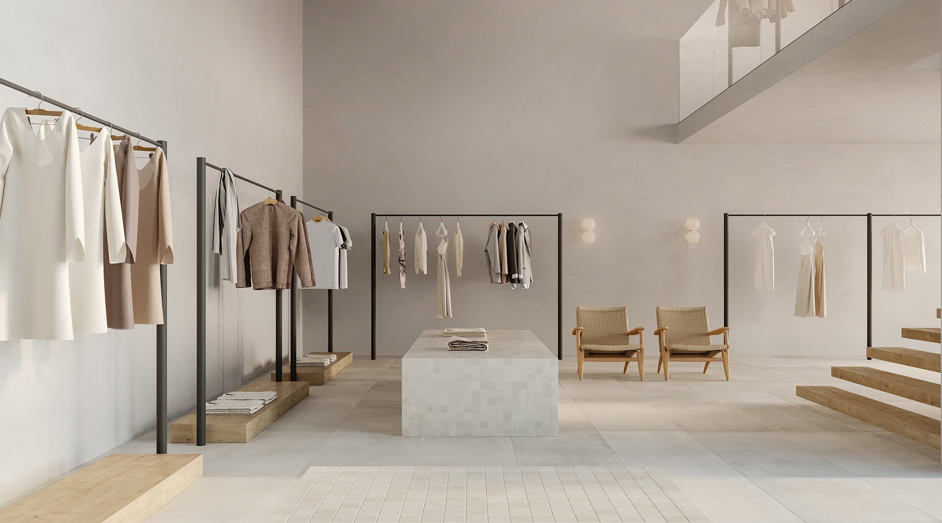 Minimalist beige boutique interior with clothing racks, mirror, chairs, and stairs