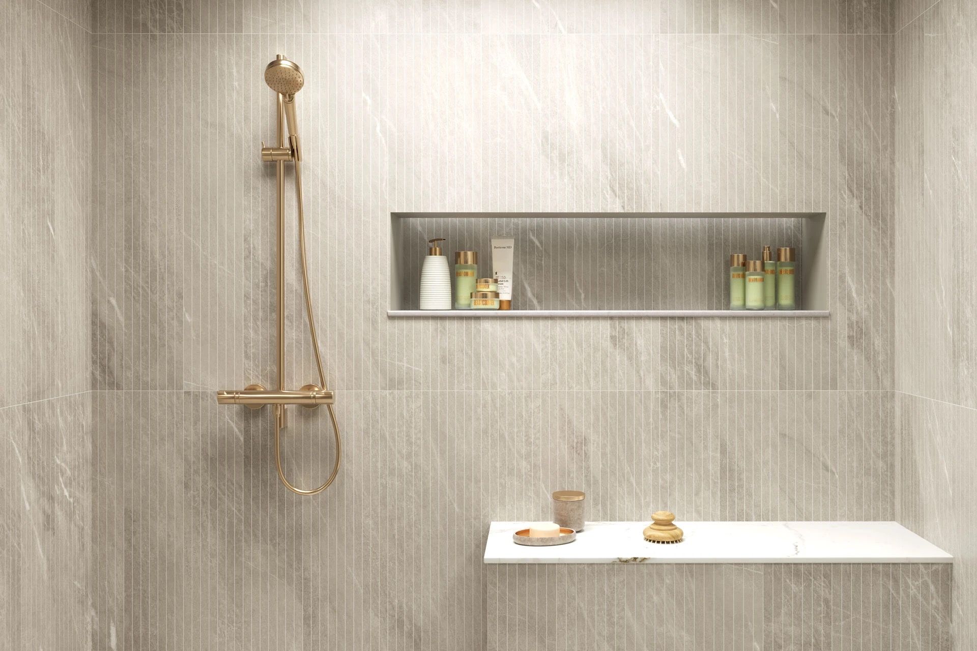 Modern bathroom with a freestanding tub, gray tile walls, and a skylight.