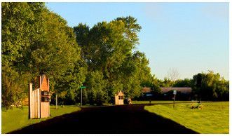 late afternoon view of a road with trees at the side