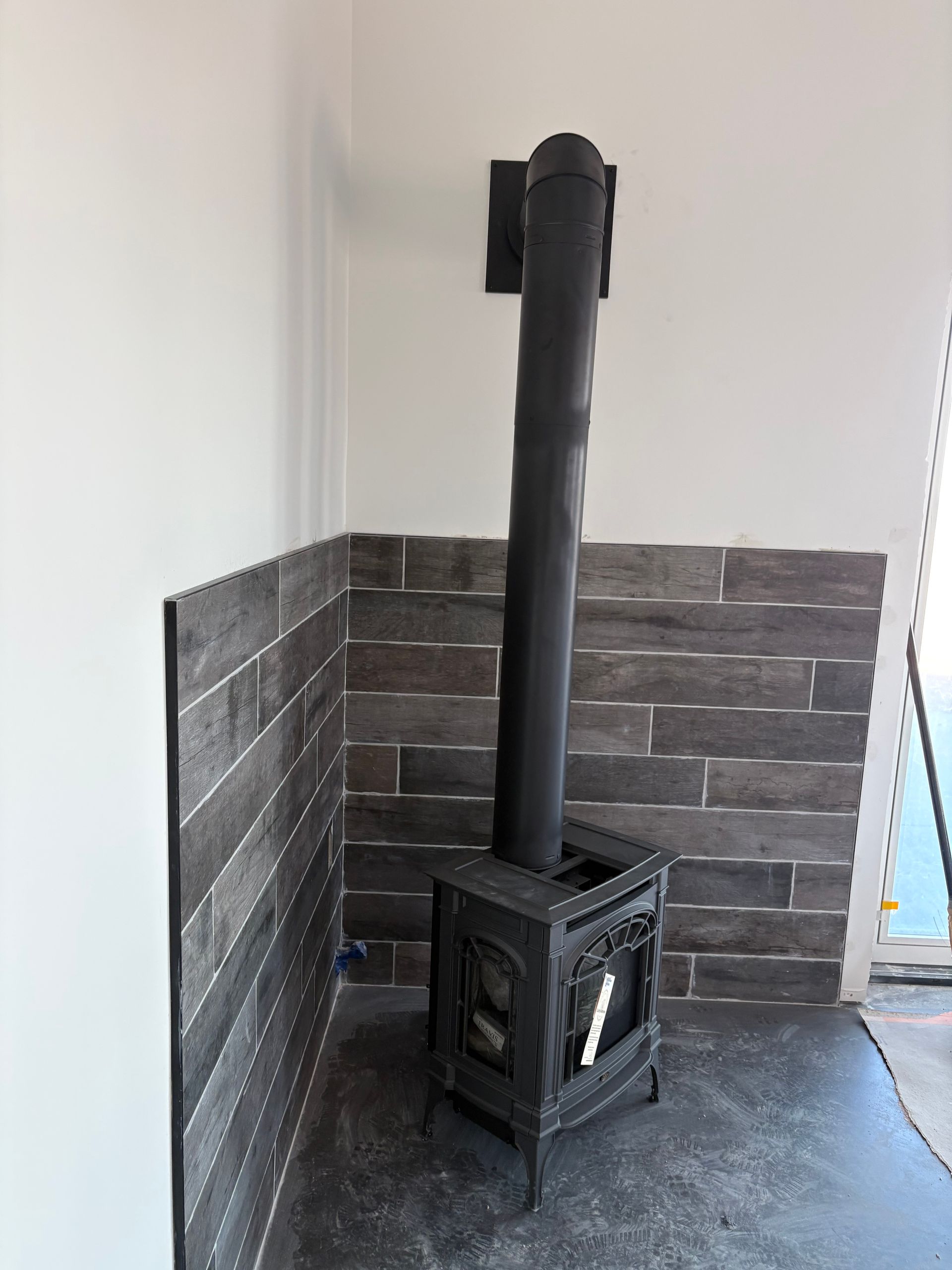 Fireplace service special ad with cozy brick fireplace, chair, and “Call Now” button