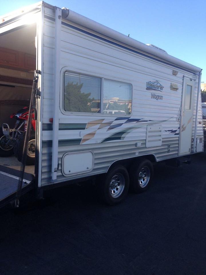 Rv trailer with motorcycle inside
