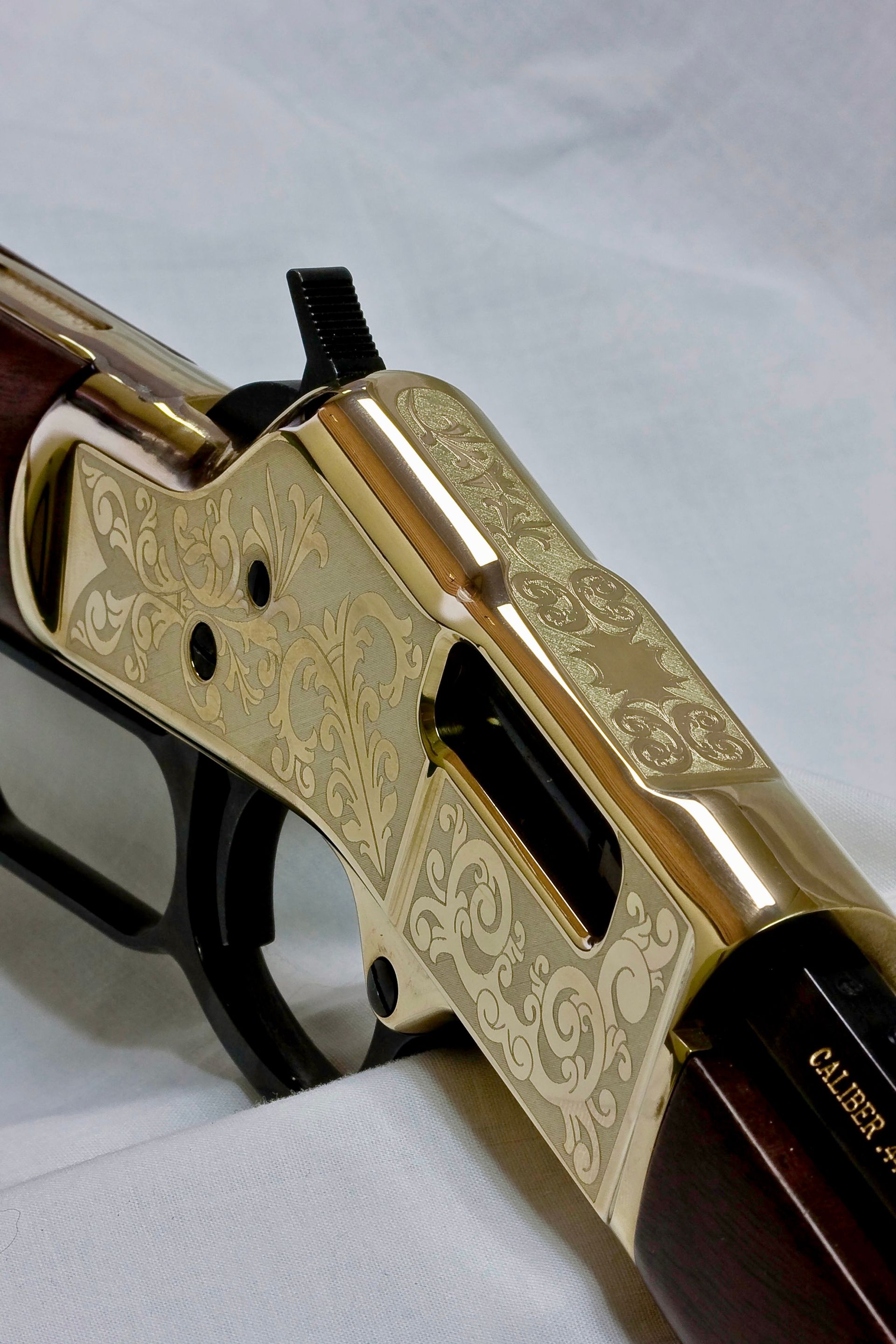 Floral engraving on a riffle