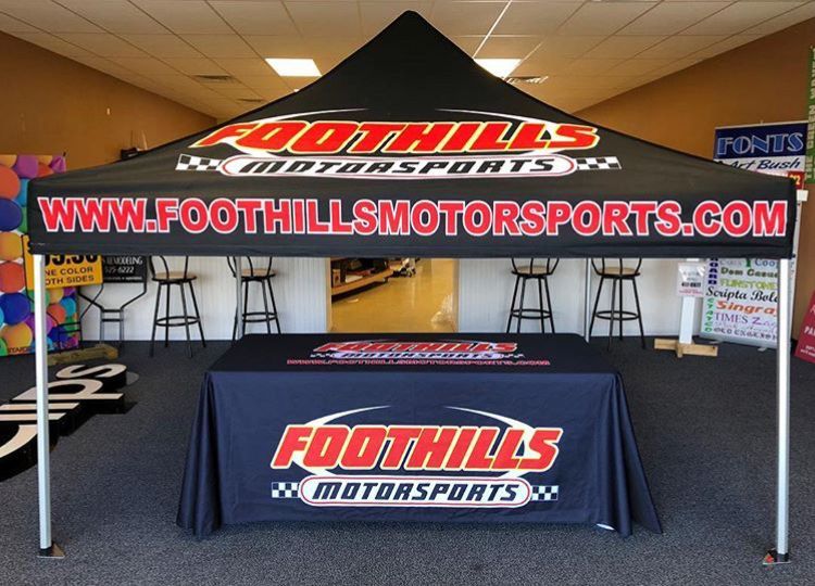 A booth for foothills motorsports is in a store