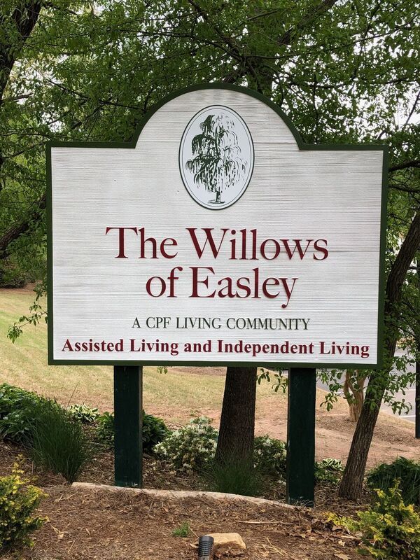 A sign for the willows of easey a cff living community assisted living and independent living