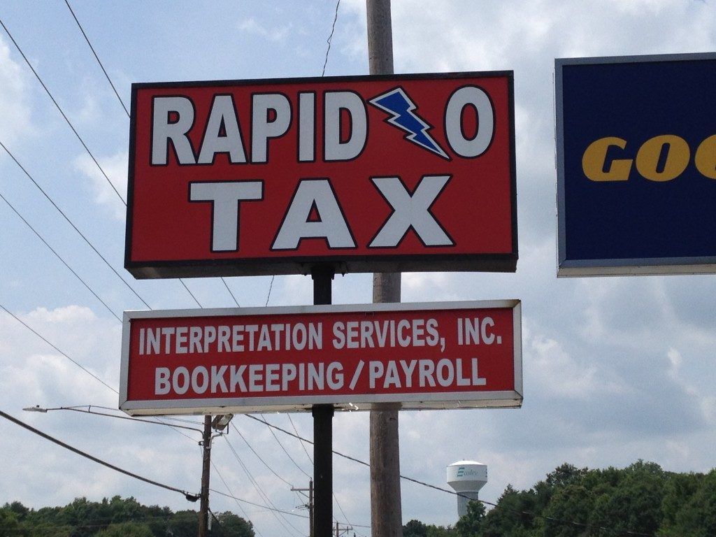 A sign for rapid tax interpretation services inc. bookkeeping / payroll