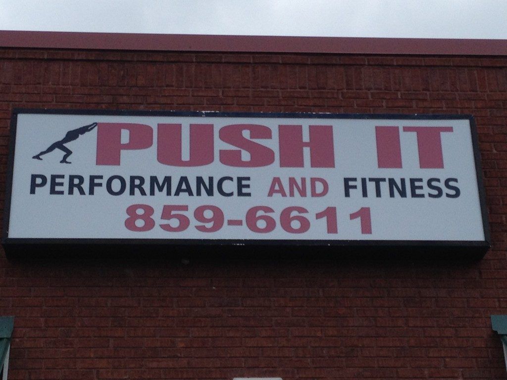 A sign for push it performance and fitness 859-6611