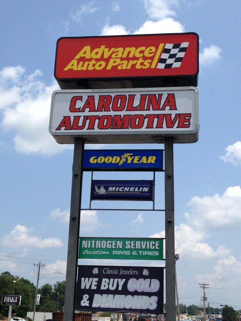 A large sign for advance auto parts carolina automotive