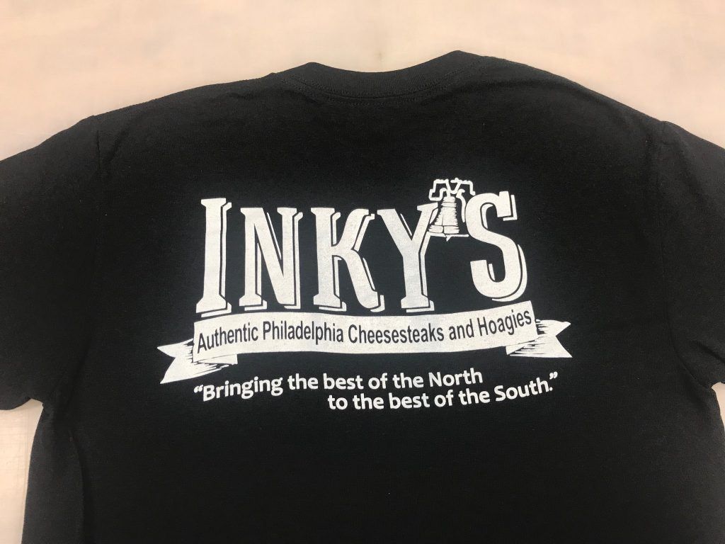 A black t-shirt that says inky 's on it
