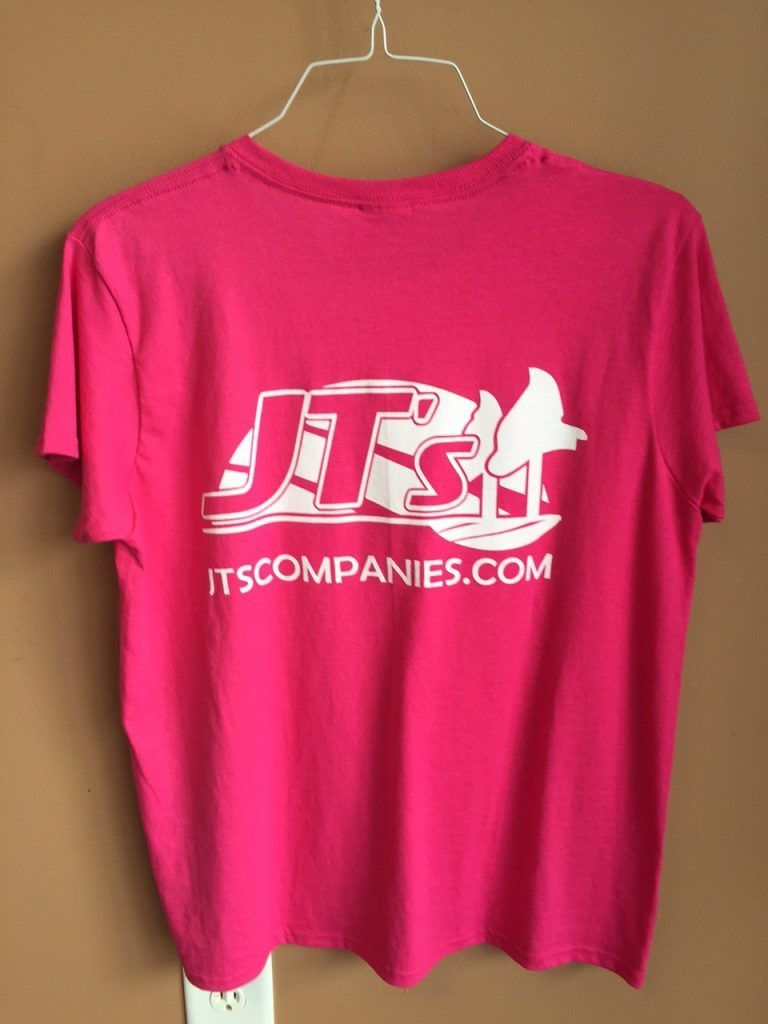 A pink t-shirt that says jts on it