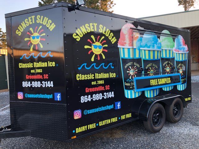 A trailer that says sunset slush on it