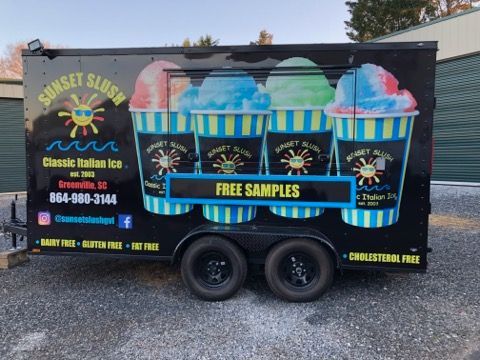 A trailer that says sunset slush on it