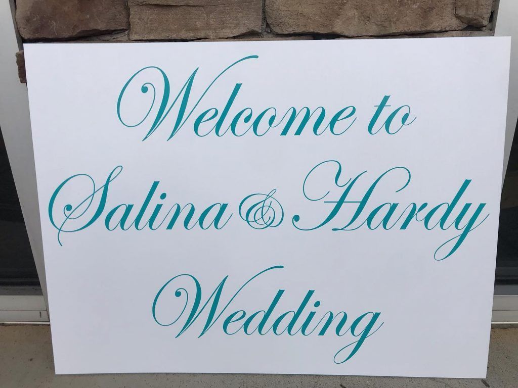 A sign that says welcome to salina and hardy wedding