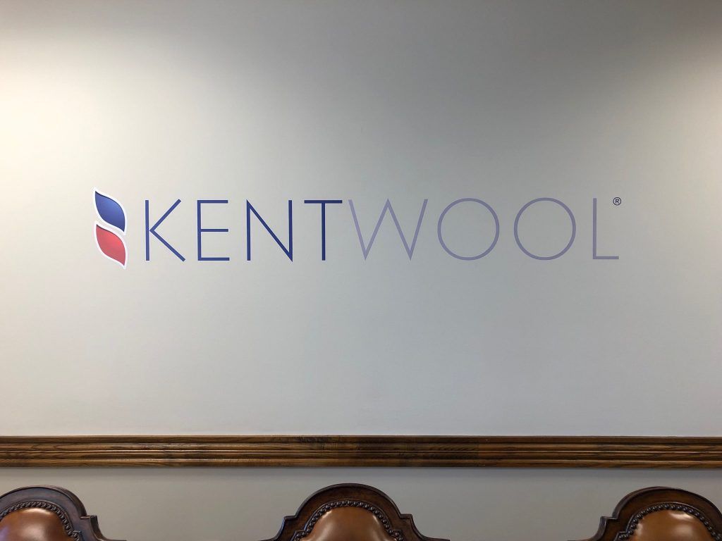 A white wall with kentwool written on it