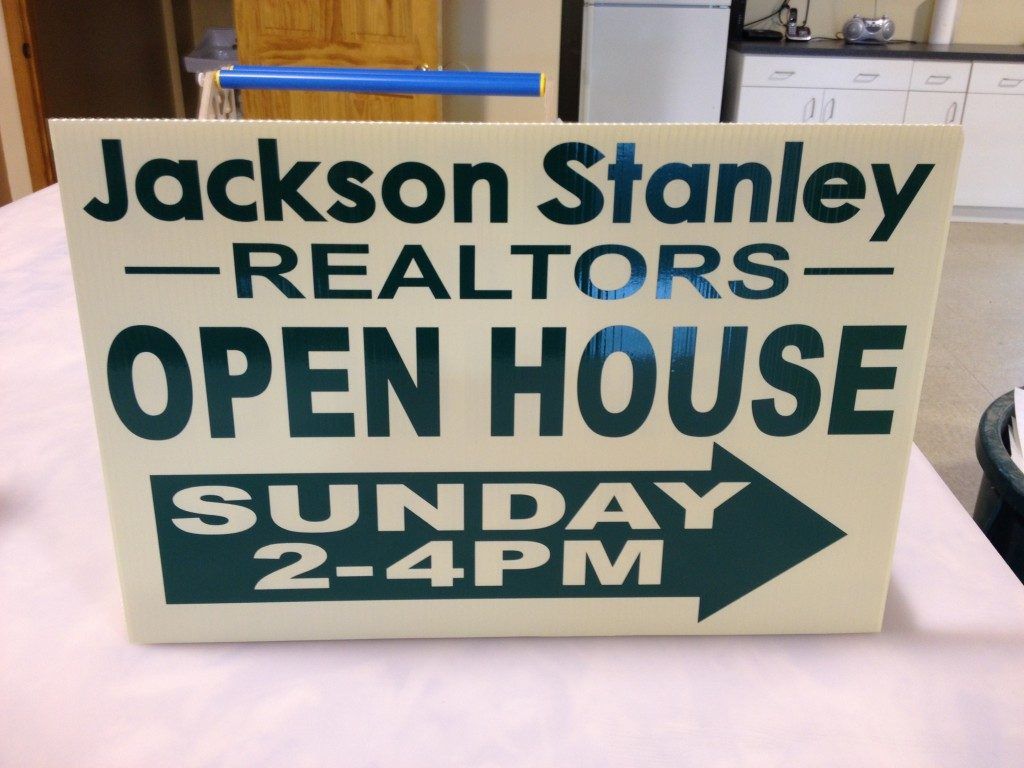 A sign that says jackson stanley realtors open house sunday 2-4pm