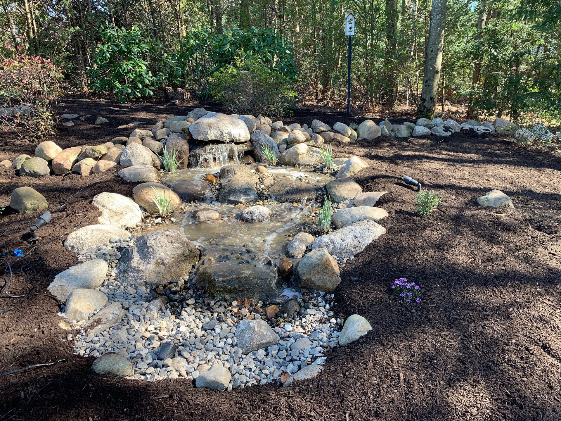 custom river bed water features