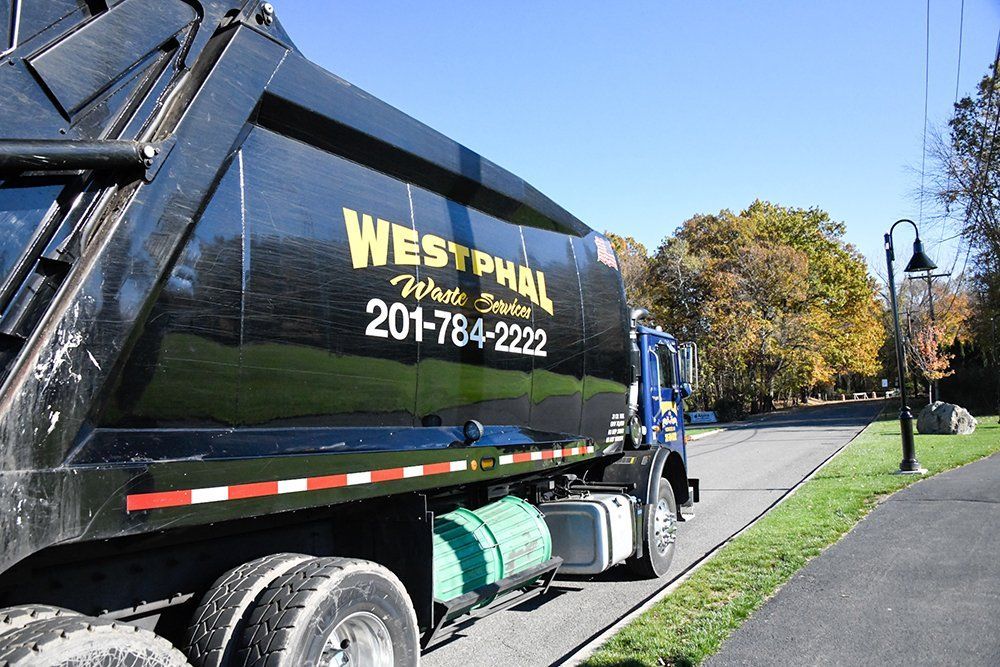 Black garbage truck with 