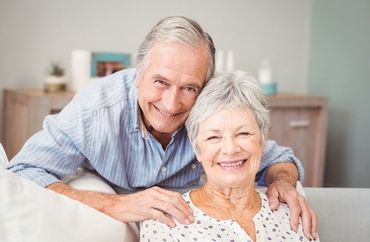 Smiling elder couple