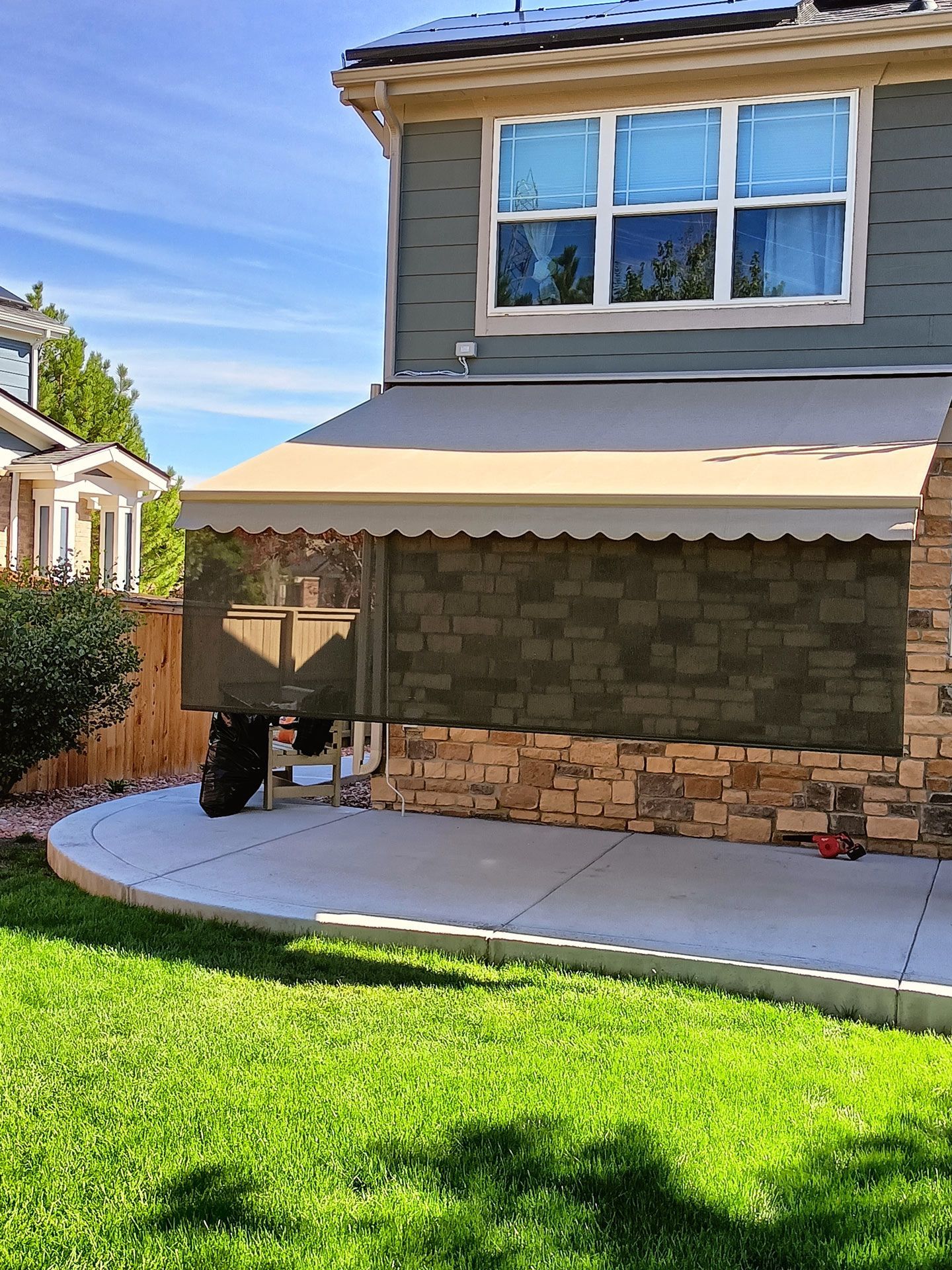 a house with a large awning on the side of it