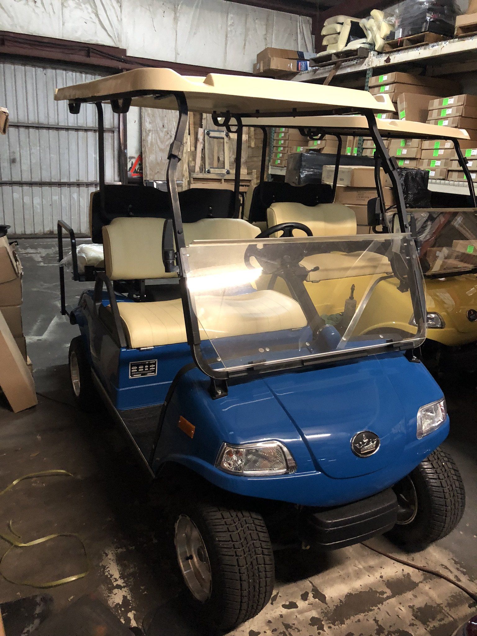 Golf cart with red and blue design