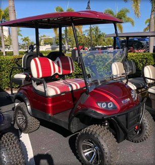 Deep red golf cart