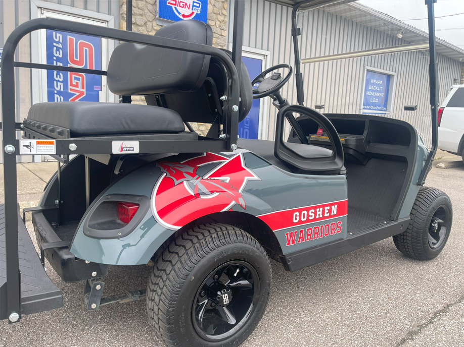 A Pine Ridge Restoration van is parked in front of a building.