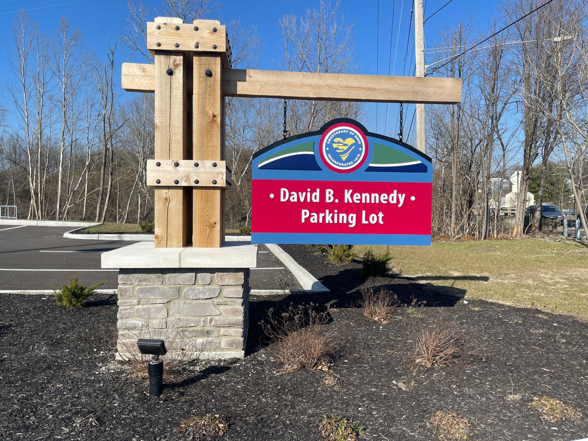 A sign for David R. Kennedy Parking Lot
