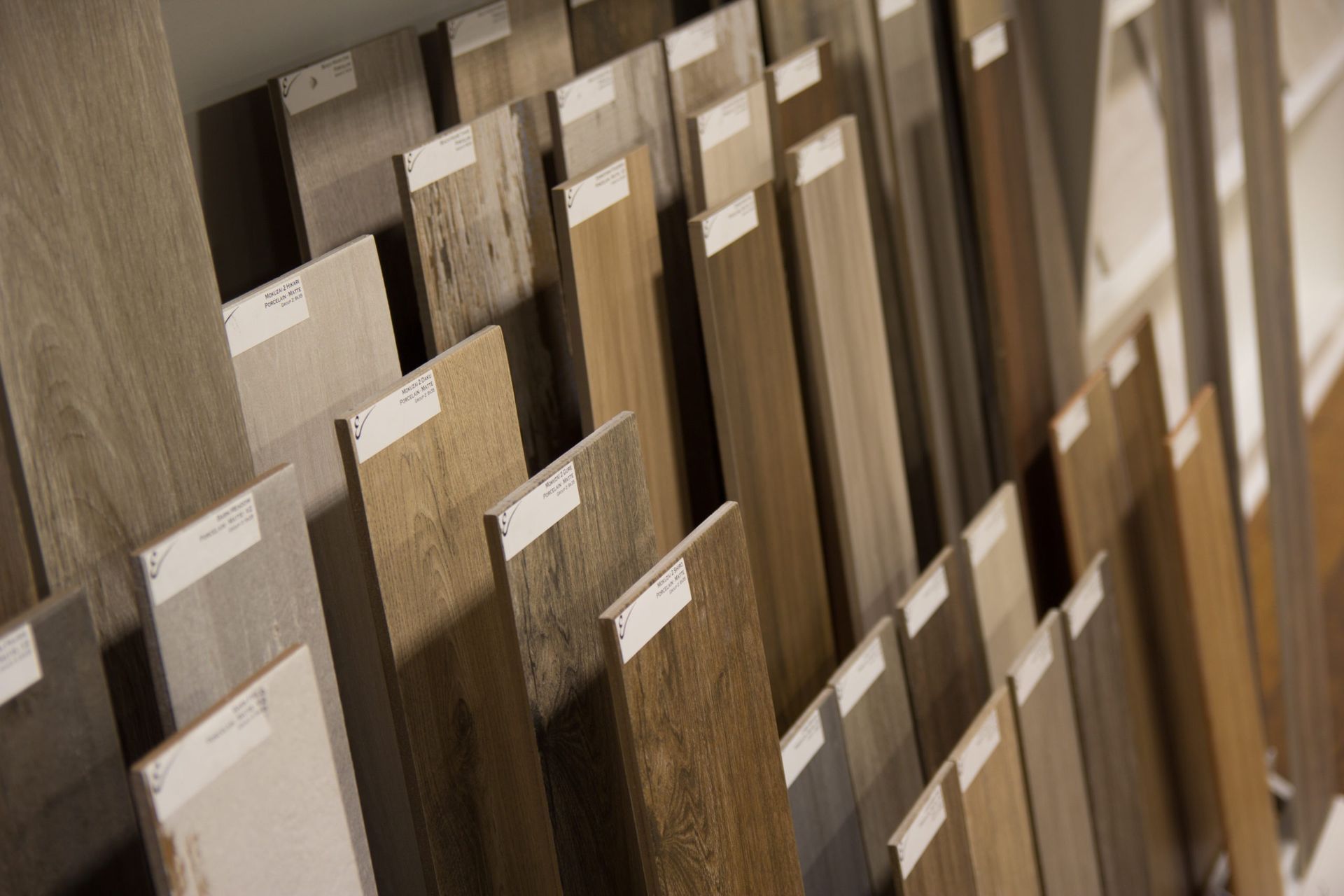 Samples of various wood flooring planks, arranged for display.