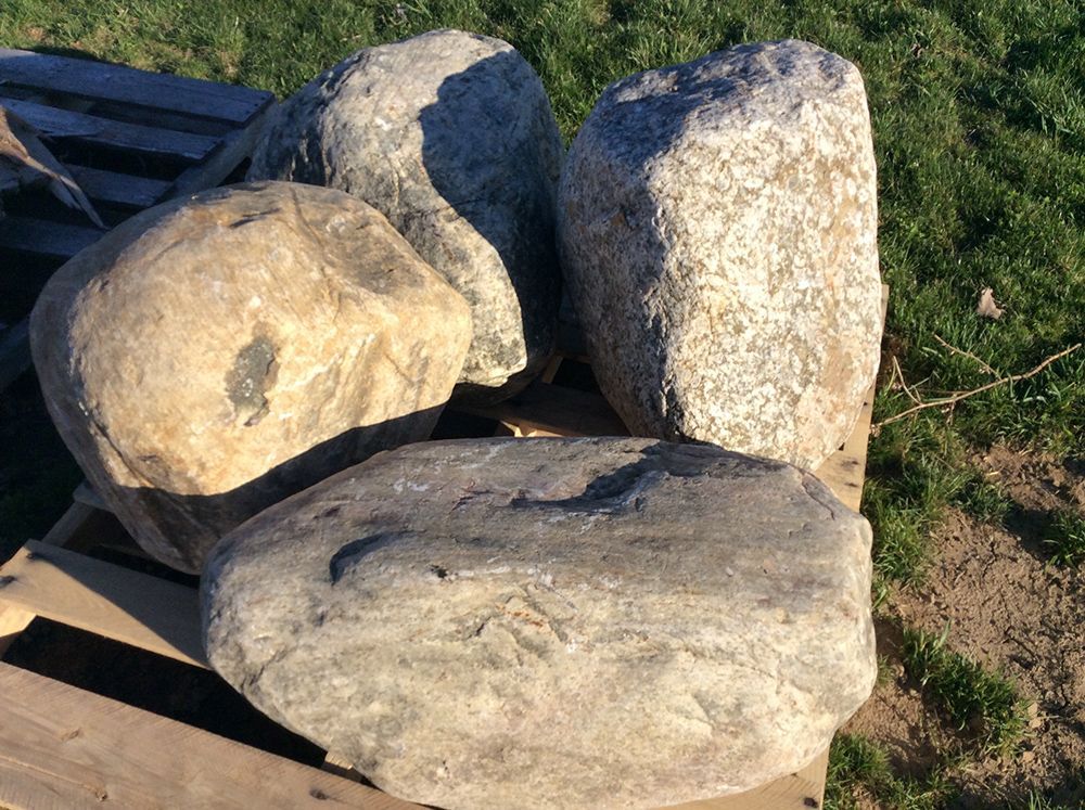 A pile of rocks sitting on top of a wooden pallet