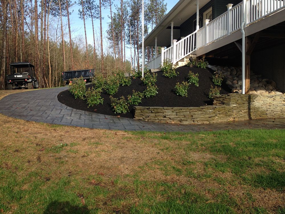 A house with a golf cart parked in front of it