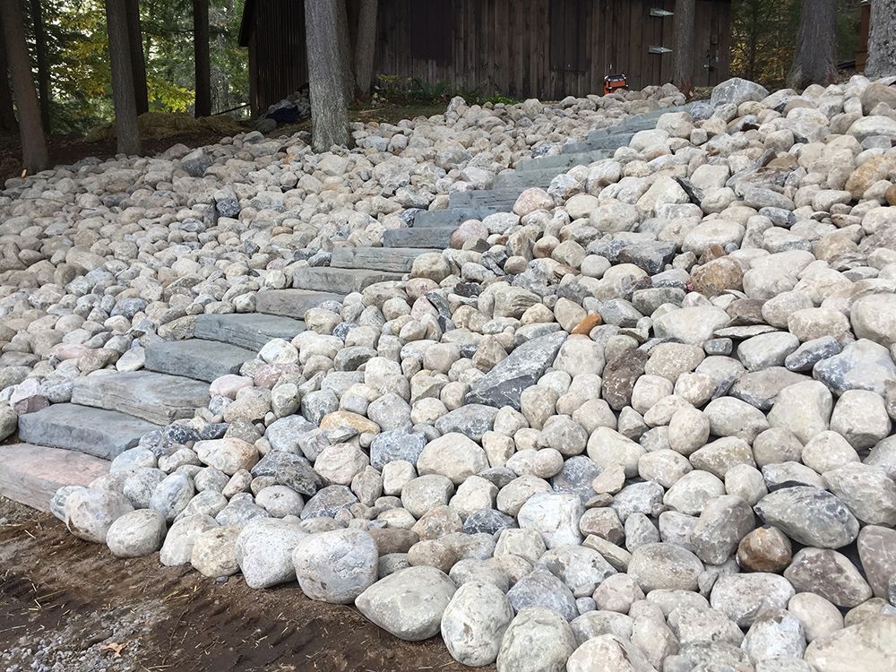 A pile of rocks with a path going through it.