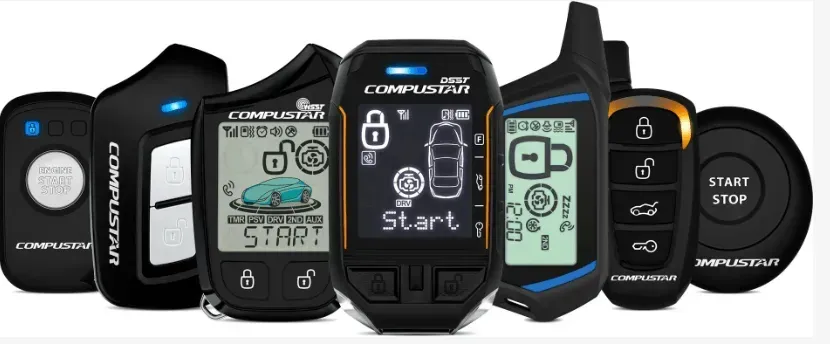 A group of compustar remote are sitting next to each other on a white background.