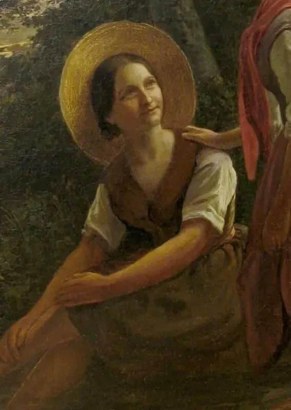 A person wearing a straw hat and earth-toned clothing sits outdoors, looking up with a soft expression.