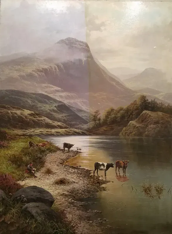 Horses drinking by a calm lake with mountains and misty hills in the background.