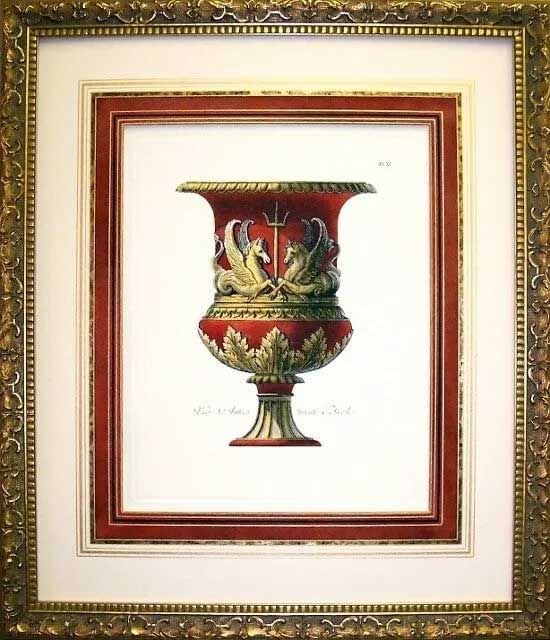 A framed, decorative print of a classical red urn featuring two winged horses and a trident, set against a white mat.