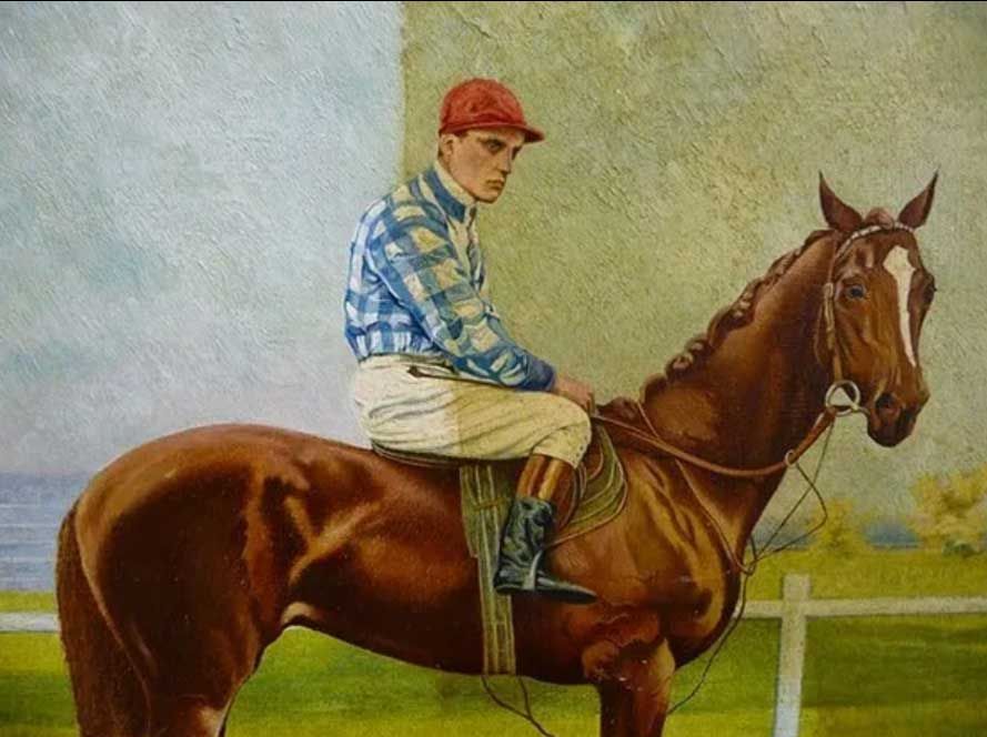 A person in a blue-and-white checkered shirt and red cap sits on a brown horse in an outdoor arena.