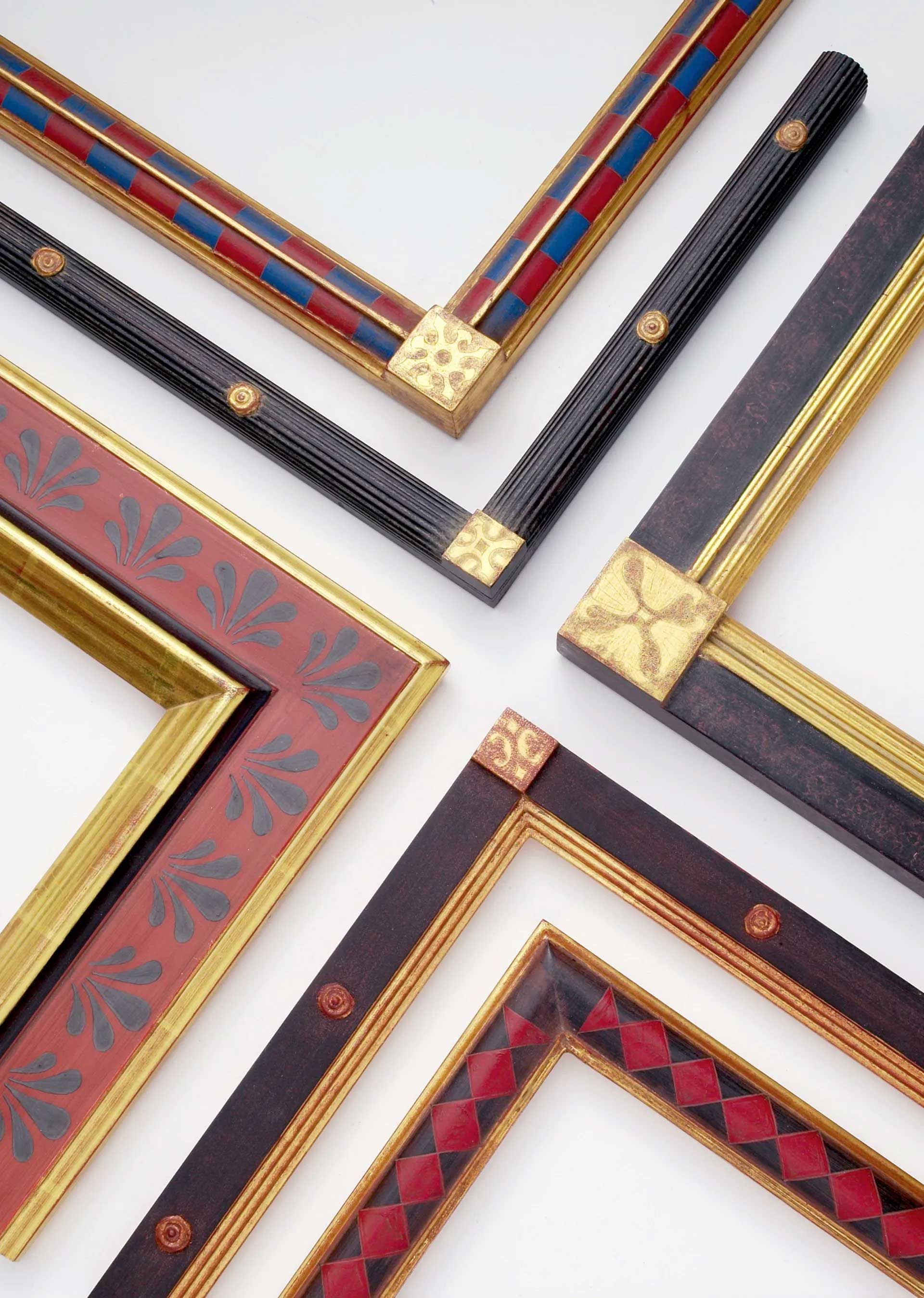 A collection of ornate, decorative picture frame corners featuring various colors, gold leaf patterns, and textures.