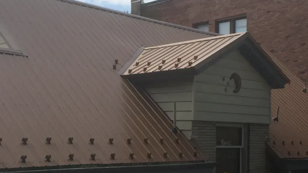 The roof of a building with the number 19 on it.