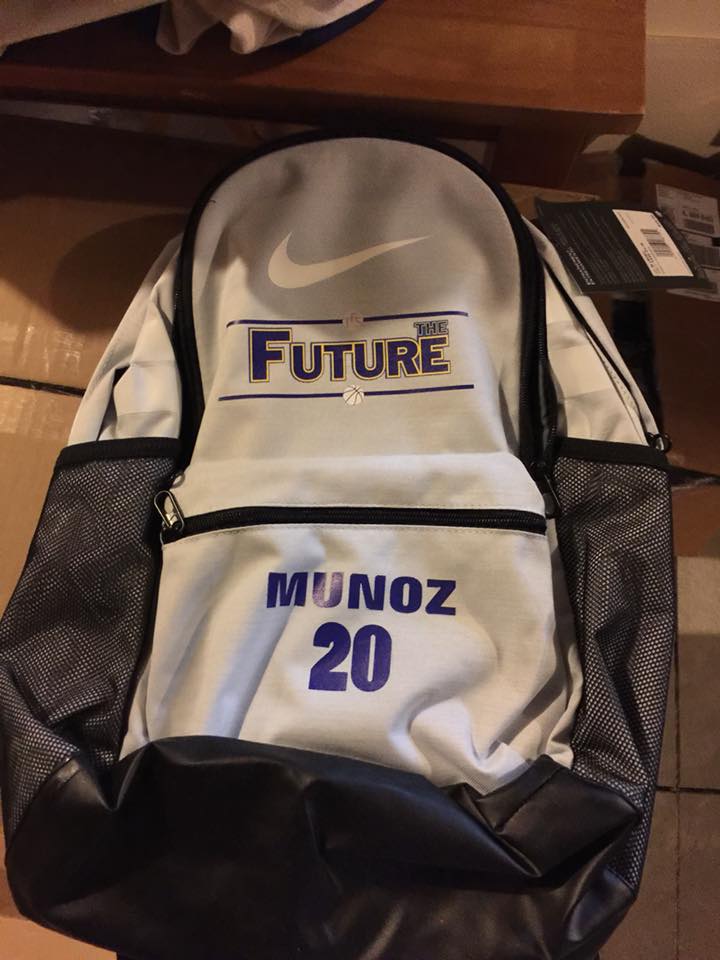 A white nike backpack with the word future on it