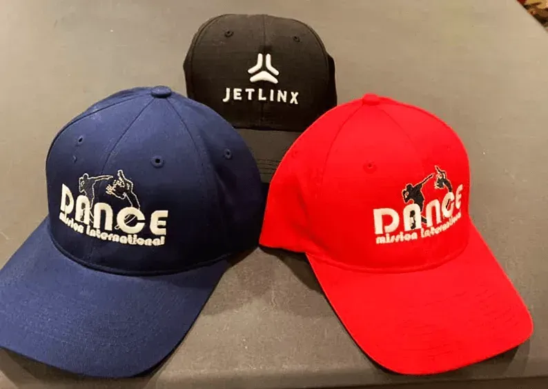 Three hats with the word dance on them.