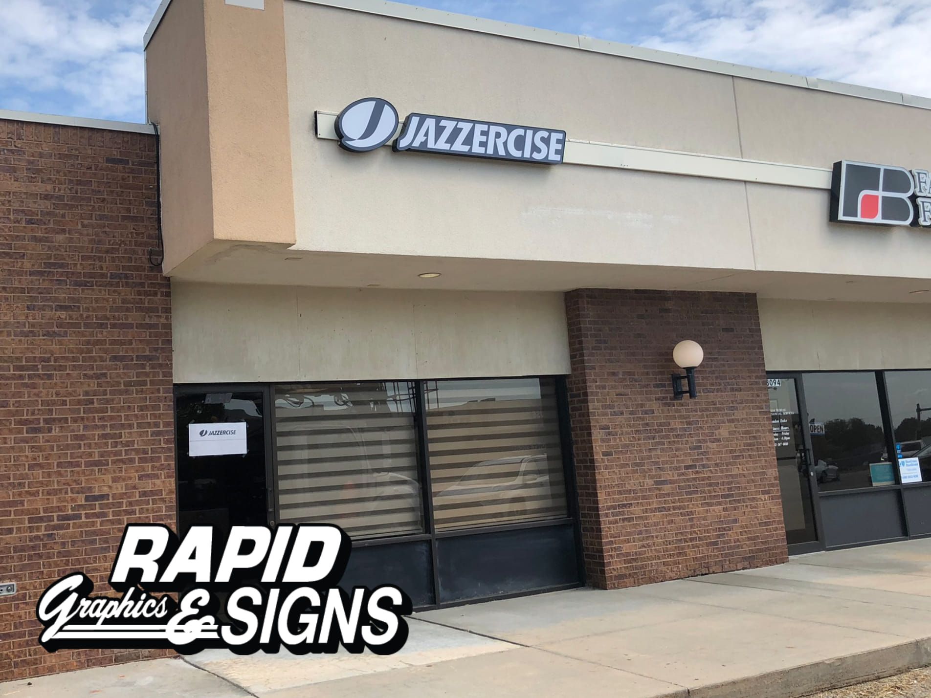 A building with a sign that says jazzercise on it