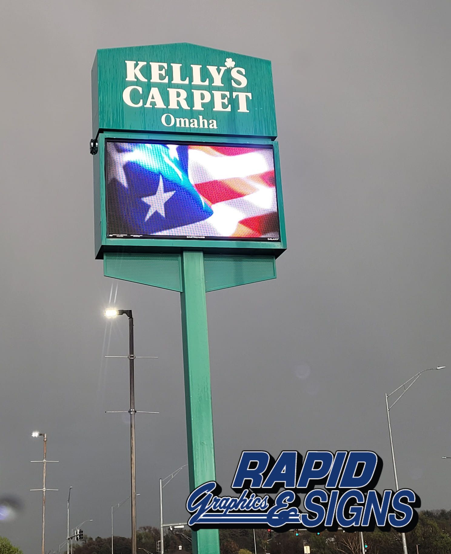 A kelly 's carpet sign in omaha shows an american flag
