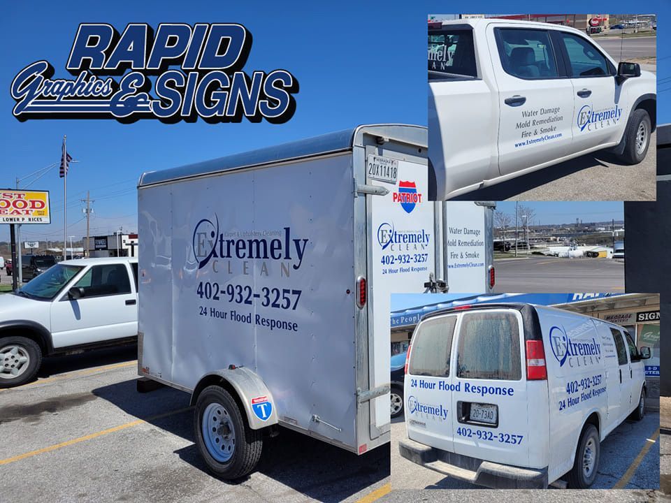 A white trailer with extremely clean written on it