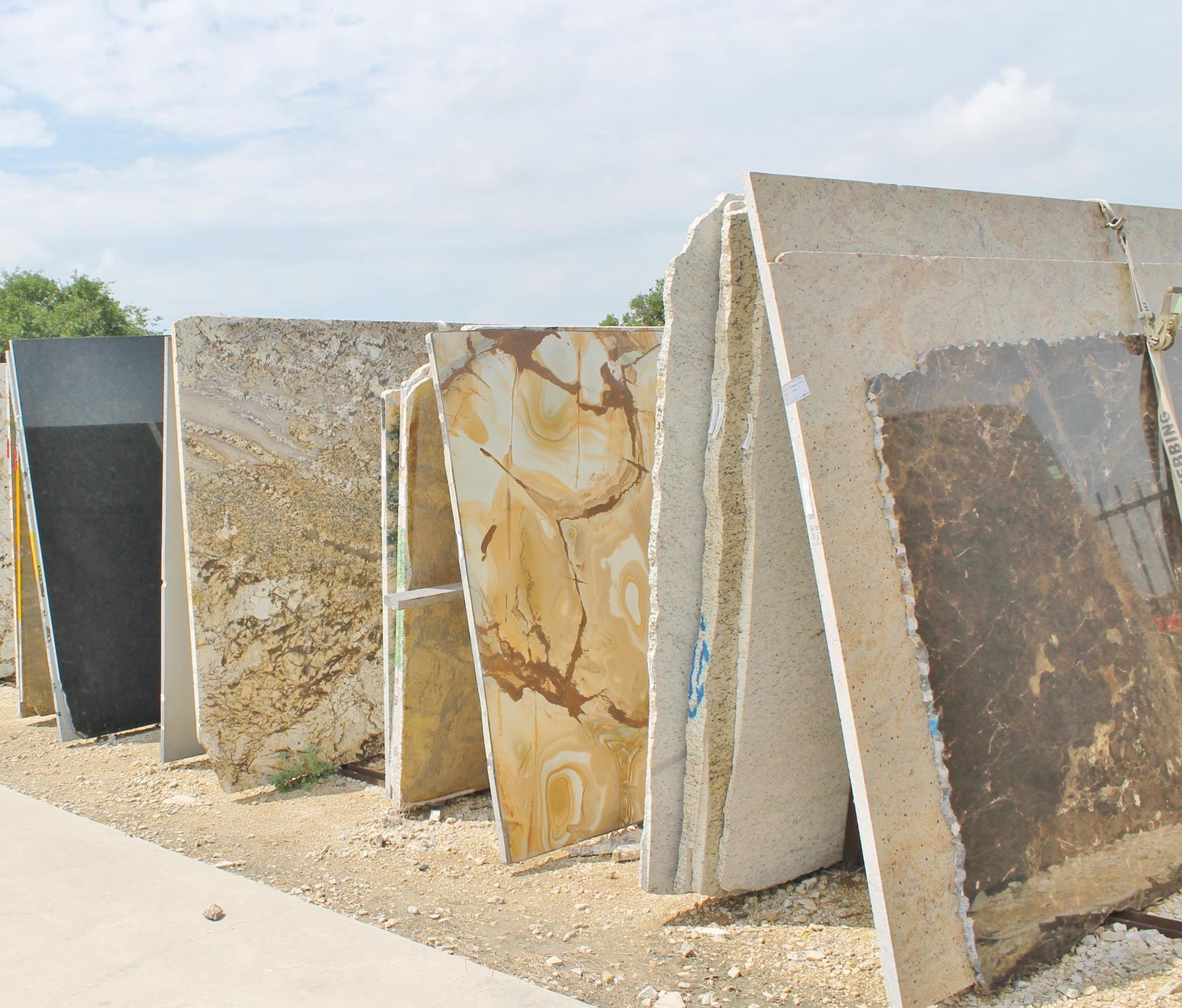 A row of granite slabs are stacked on top of each other