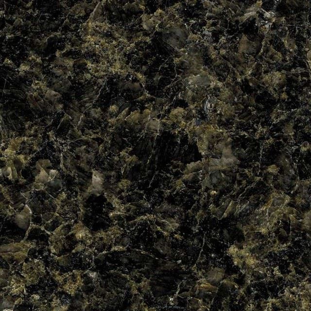 A close up of a black granite counter top