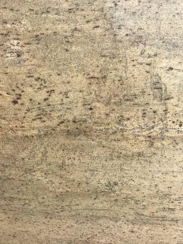 A close up of a piece of wood with a grainy texture.