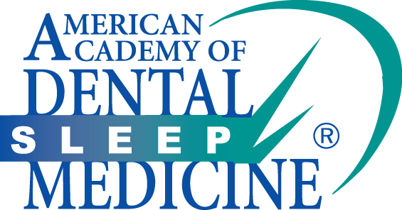 Logo of the American Academy of Dental Sleep Medicine: blue text with green checkmark over a teal arc.