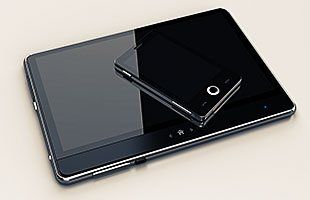 Black tablet and cellphone