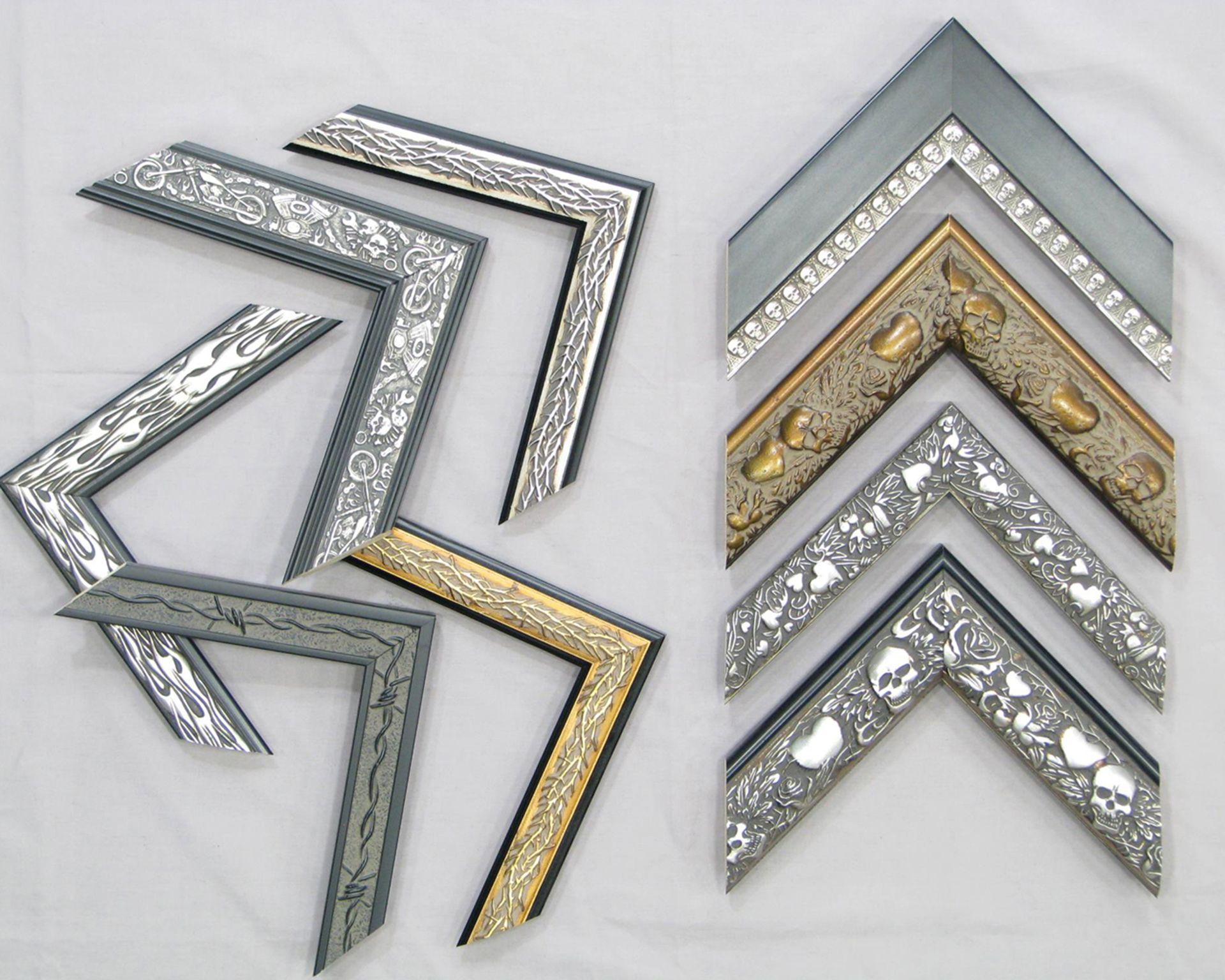 Silver and gold picture frames are arranged in a row